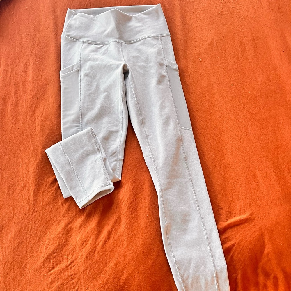 Light Grey Fabletics Power hold leggings with pockets. Only wore twice.